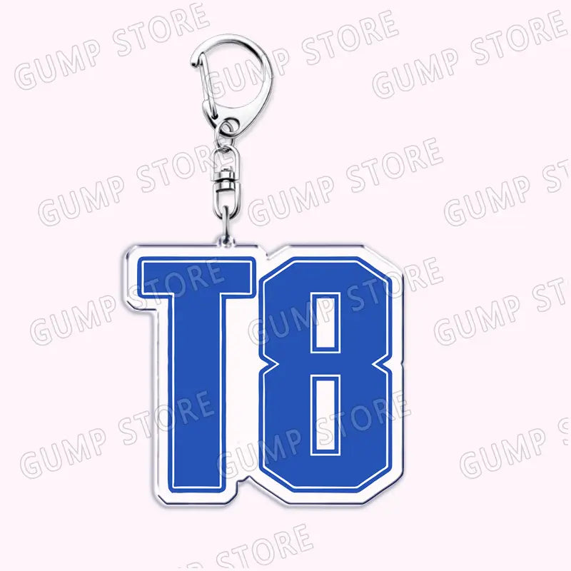 Blue and white 18 inch jersey-style acrylic keychain with silver metal clasp for Tate Mcrae music fan gift.