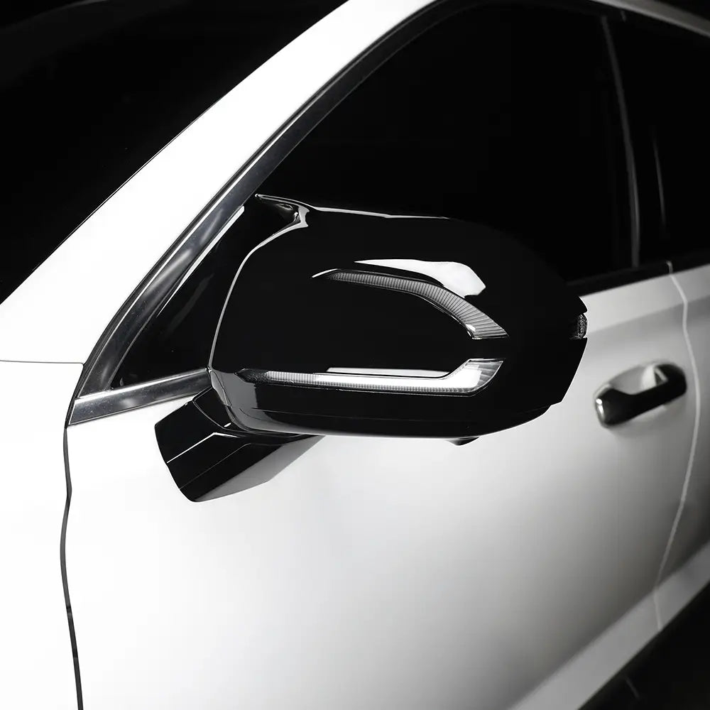 Black glossy Hyundai Palisade led mirror cover with integrated led lighting strip designed for 2020-2025 models showing the front side of the product.