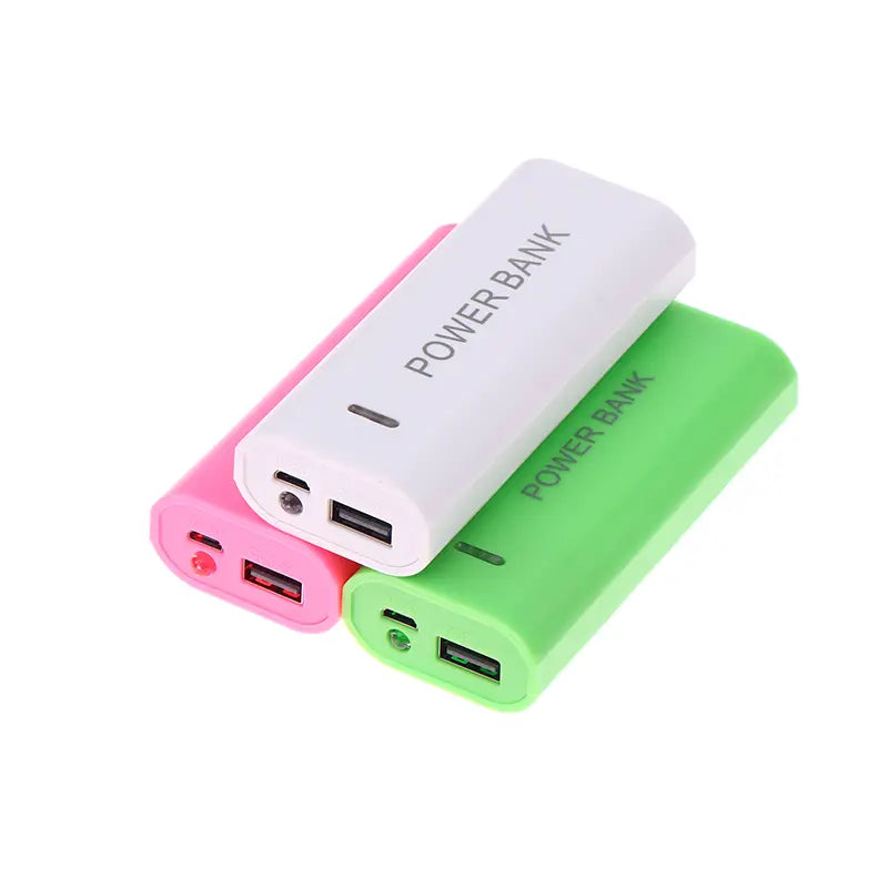three slim rectangular power bank cases for 18650 batteries in pink white and green with power bank printed on their sides designed as portable power banks