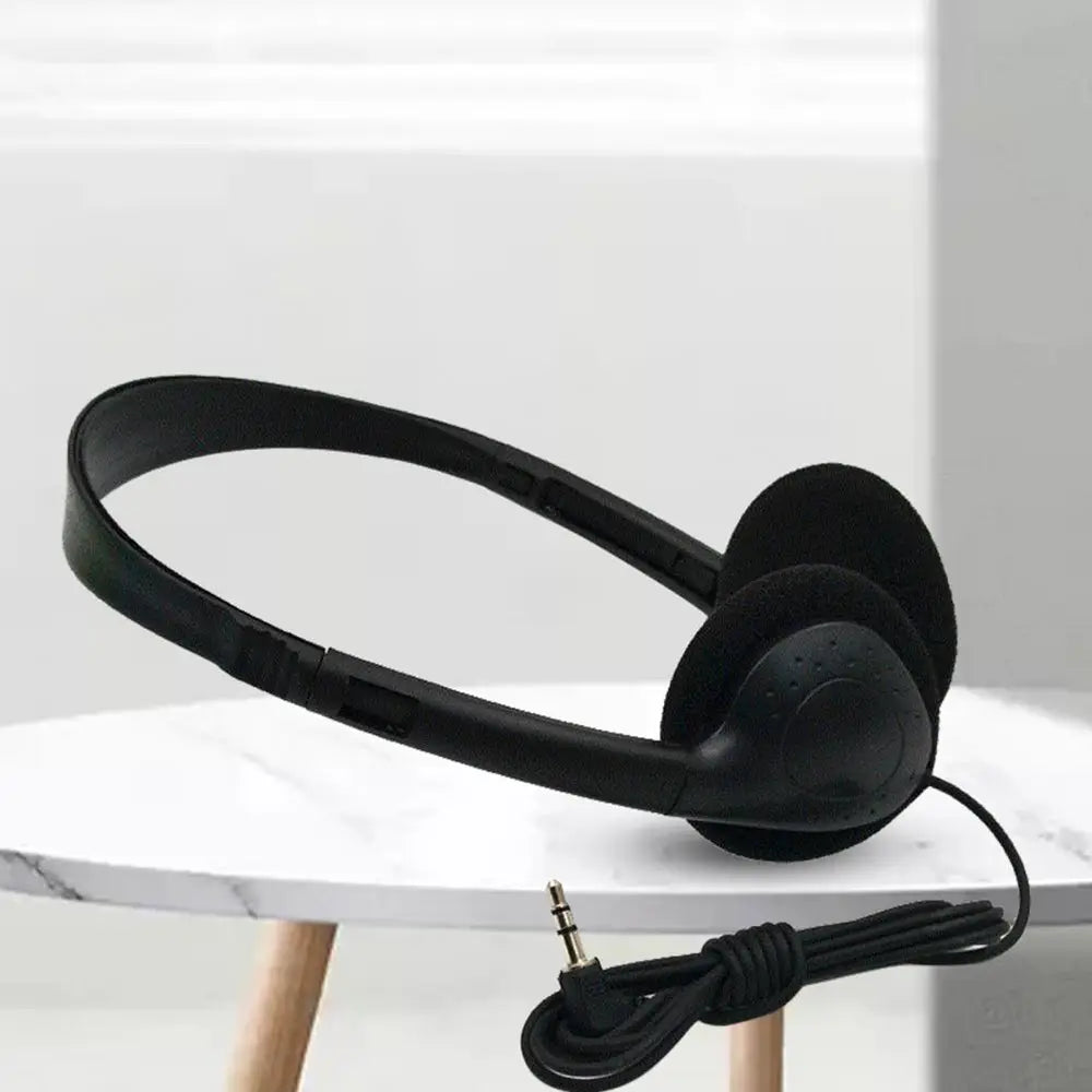 casque de jeu filaire noir avec des fonctions de réduction du bruit, des coques supra-auriculaires rembourrées et un câble en spirale avec fiche de type 3,5 mm, pour un usage confortable à long terme