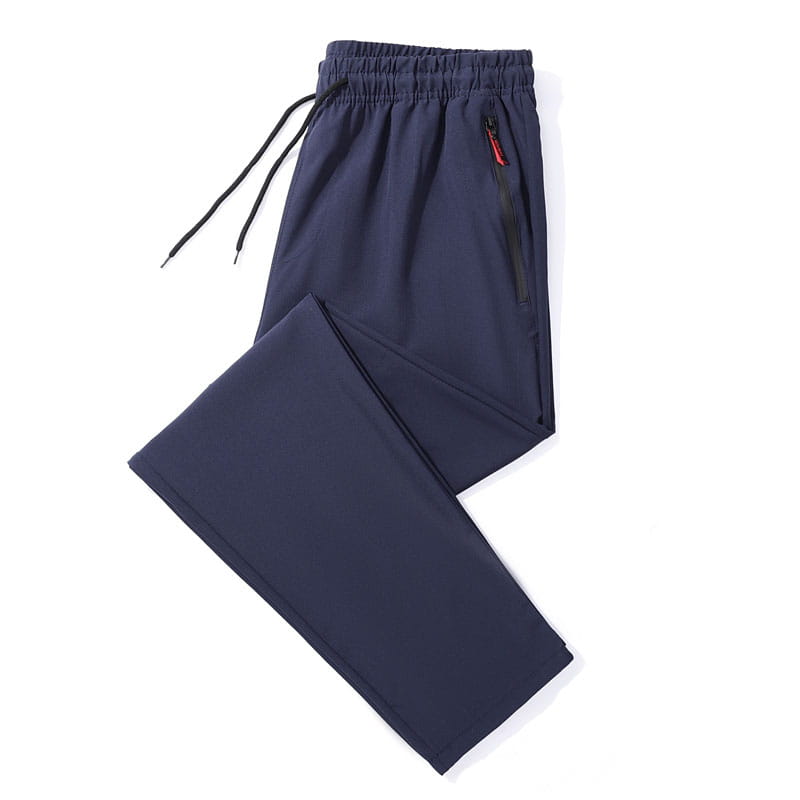 Joggers casuales ajustados para hombre en azul marino oscuro con cintura elástica y cordones negros, diseñados para uso deportivo y casual.