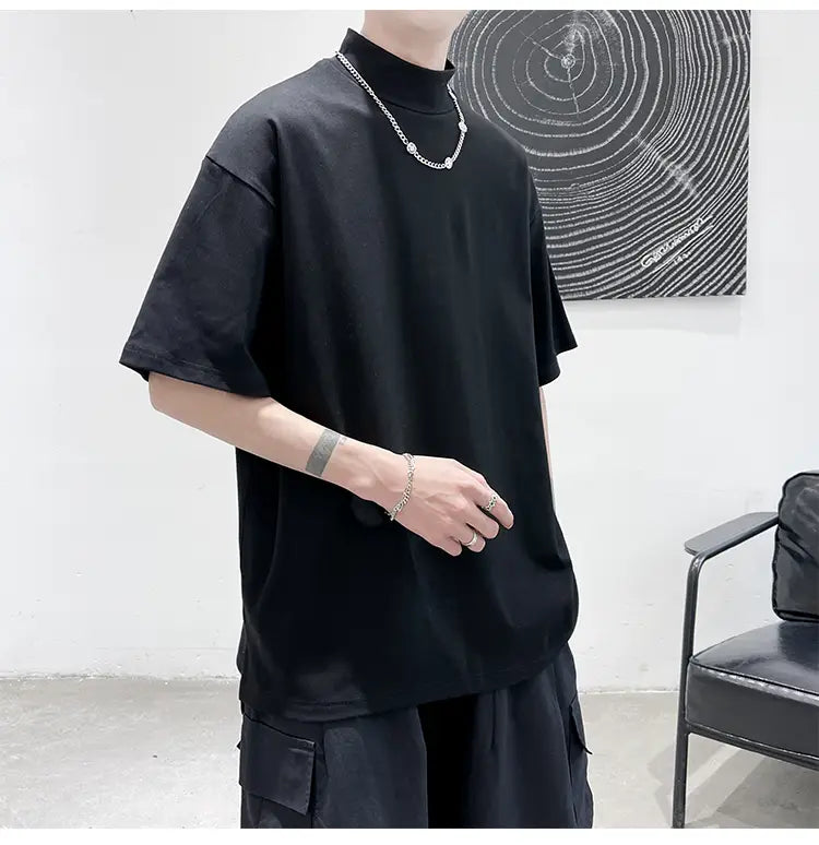 black short-sleeved oversized turtleneck t-shirt with a relaxed fit designed for men casual streetwear