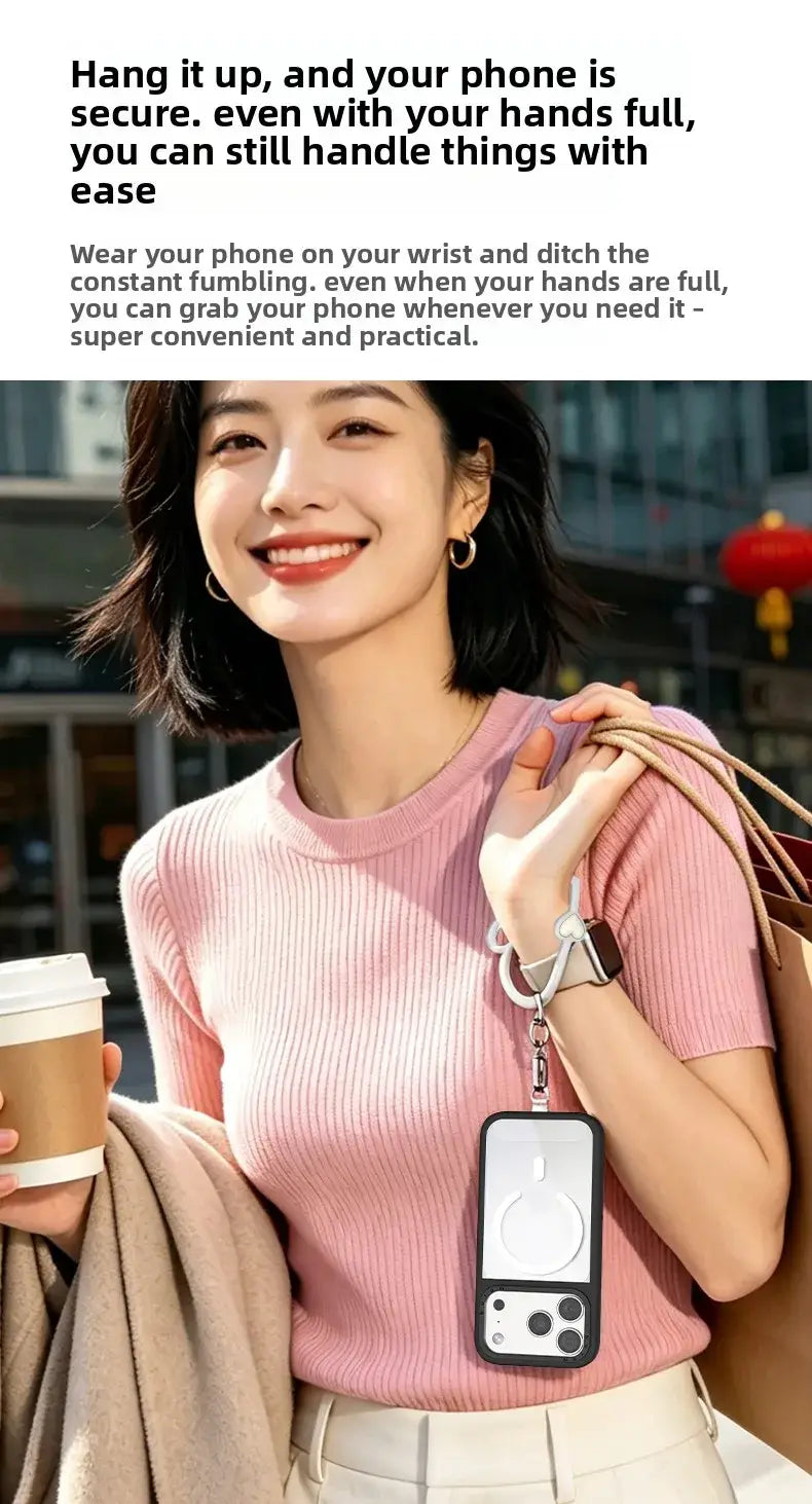 eine elegante schwarze Handyhülle mit weißem rundem magnetischem Ladepad und Aussparungen für die Kamera, mit einem Silikon-Herz-Handy-Handgelenkriemen, der für ein bequemes Tragen des Smartphones an der Hand entwickelt wurde
