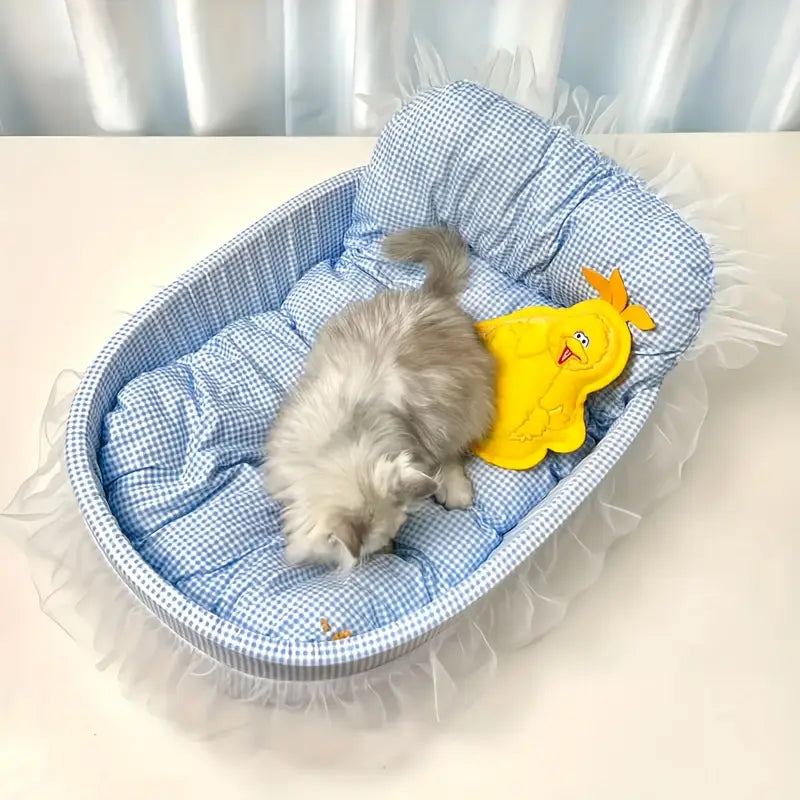 Blue and white checkered pet bed with ruffled lace edge designed as a comfortable cat sofa bed.