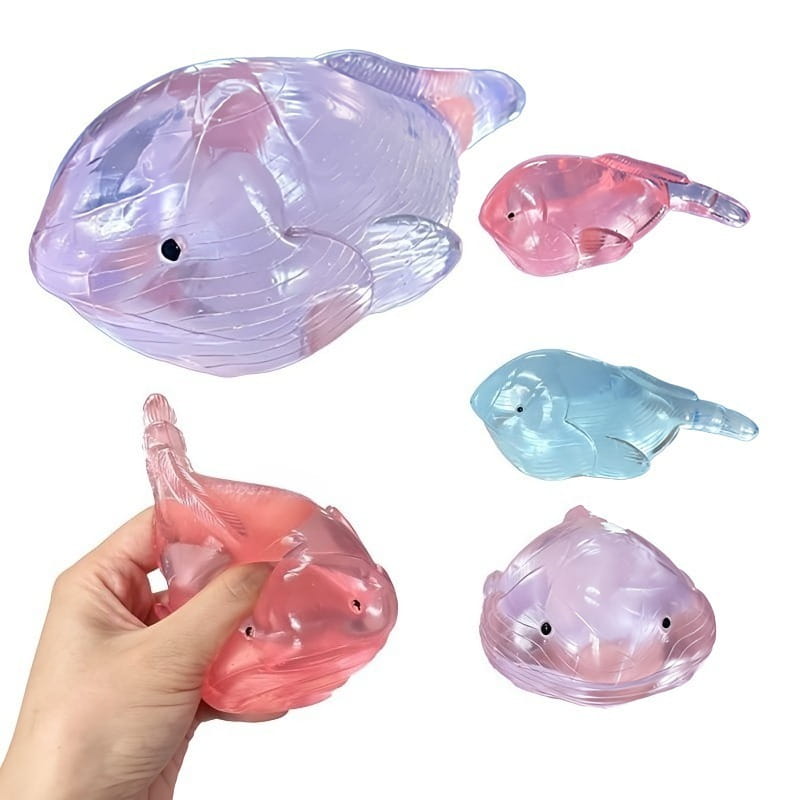 un ensemble de jouets anti-stress à mâcher « baleine » translucides, en forme de poisson et aux couleurs pastel, dans des tons rose et bleu doux, avec des surfaces en plastique brillantes conçues comme relaxants anti-stress.