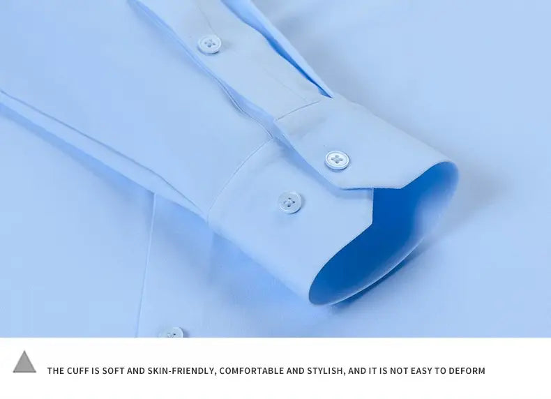 Light blue cotton cuff with white buttons on a men’s slim fit nylon formal dress shirt.