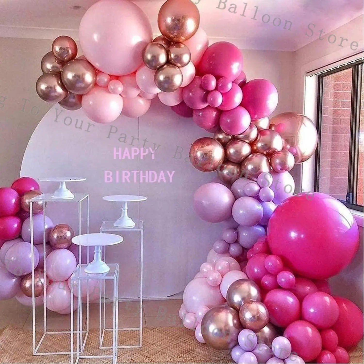 a festive pink balloon arch kit featuring glossy pink rose gold and lavender balloons arranged in a cascading design for weddings and birthday parties