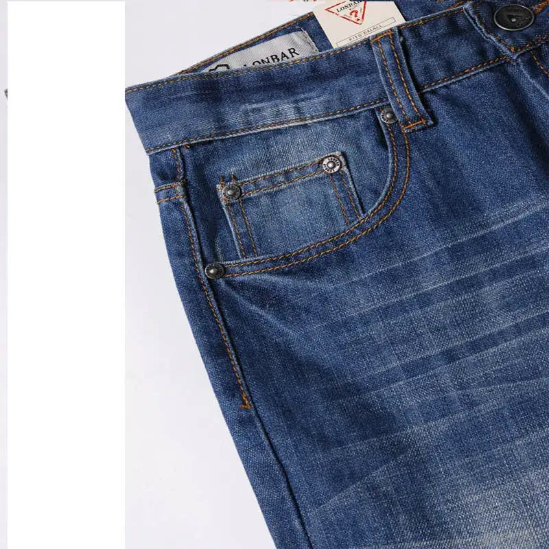 Men’s flared denim jeans bootcut casual pants in blue with classic five-pocket design and contrasting stitching.