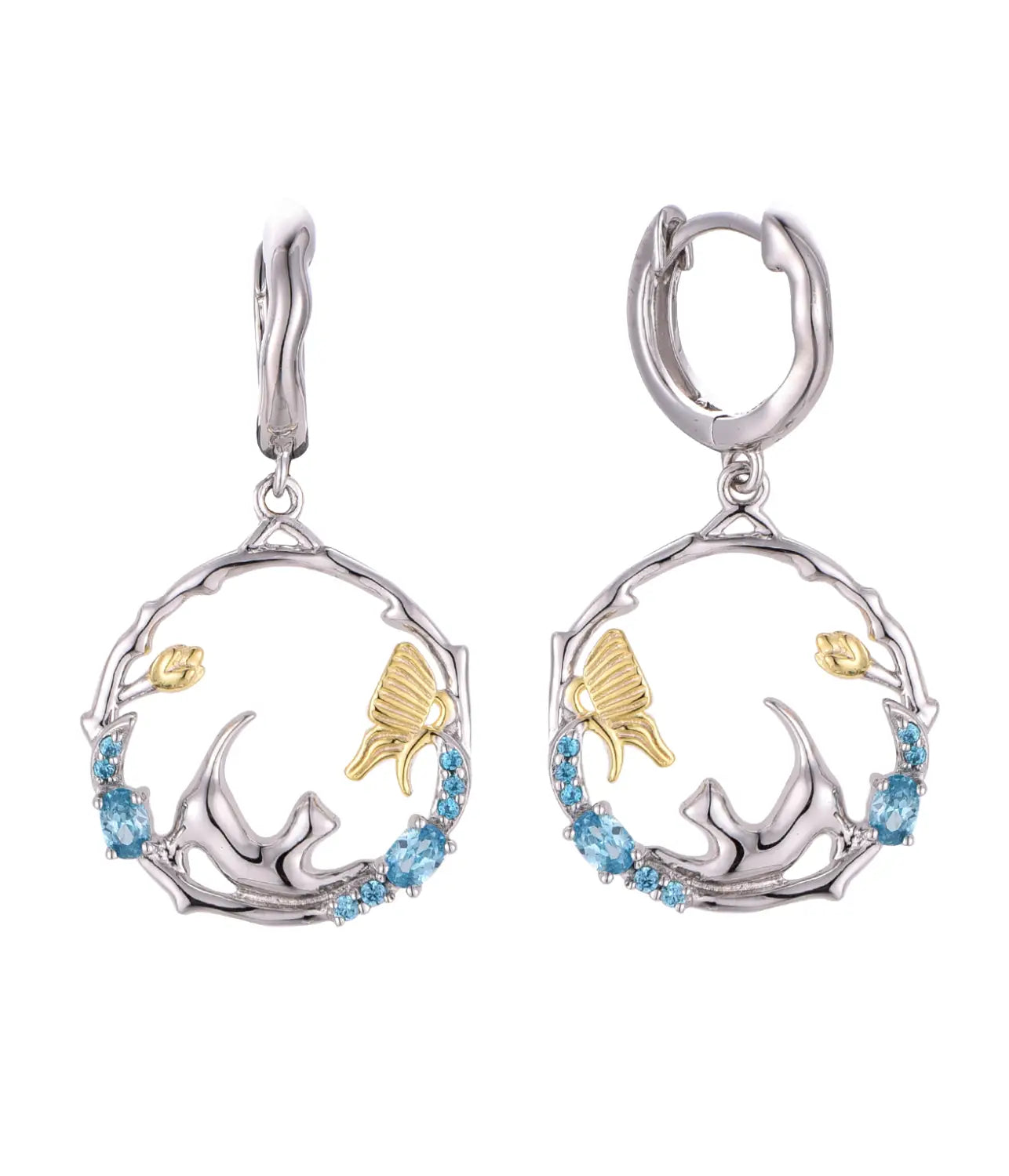 Silver and gold two-tone dangle earrings in a 925 silver cat zirconia jewelry set featuring circular design with butterfly motifs blue gemstones and delicate leaf accents.