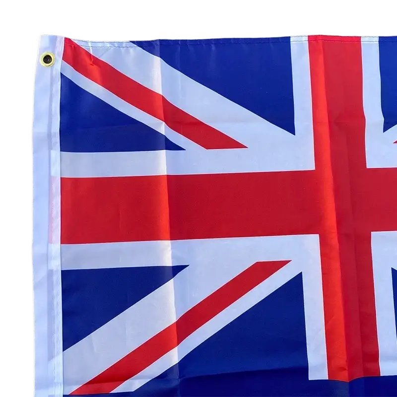 A vibrant red white and blue australia national flag made of polyester with a yellow grommet for hanging and celebration decor