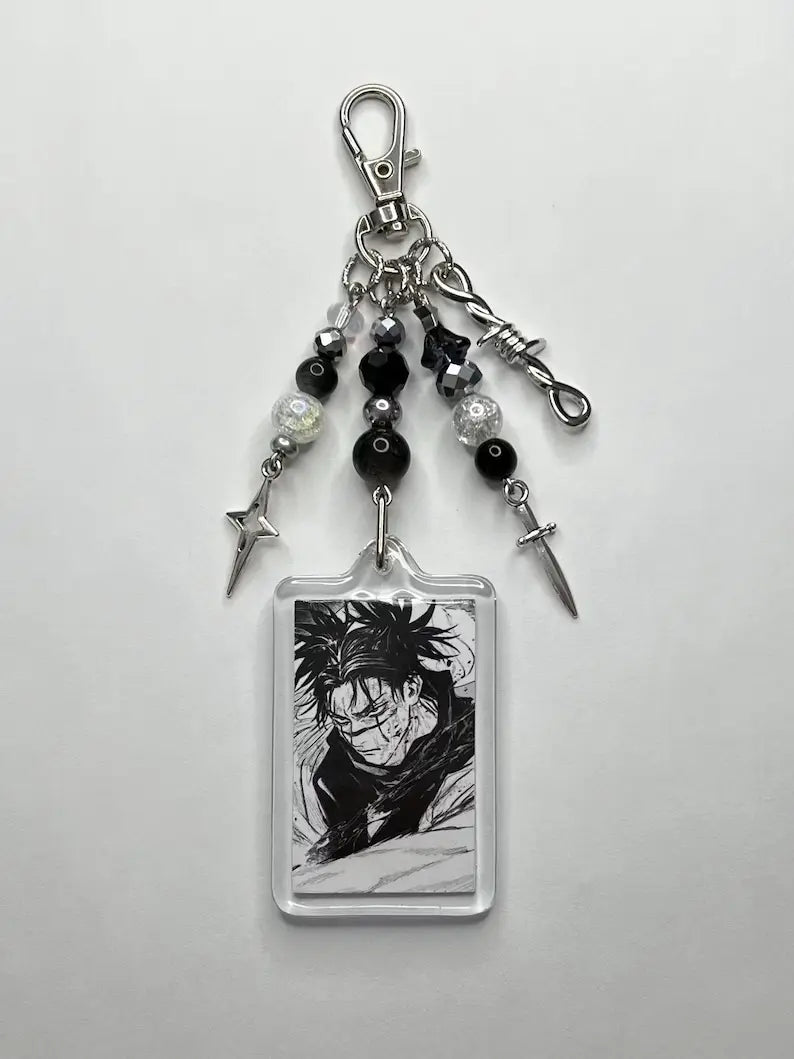 Clear acrylic keychain featuring a black and white anime character illustration of Choso, adorned with silver-toned metal charms including beads and dagger-shaped pendants, from the Choso Y2k anime beaded acrylic keychain collection.