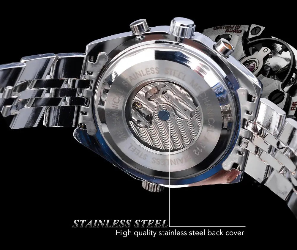 A sleek silver mechanical stainless steel men’s chronograph watch with a polished metal bracelet and exposed mechanical movement.