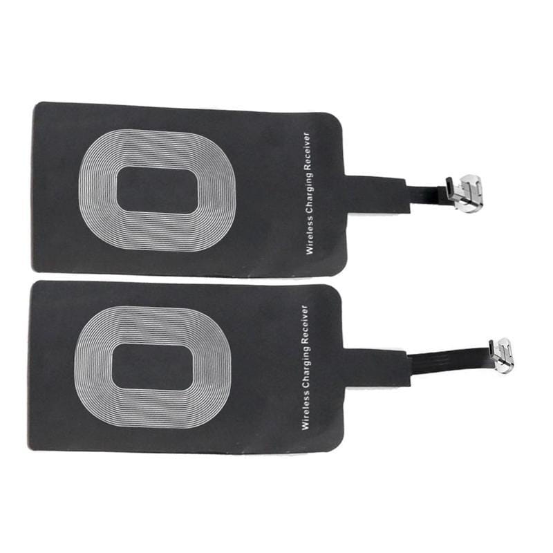 black wireless charging receiver pads for type c android phones featuring silver coil designs and metallic connectors designed for wireless charging.