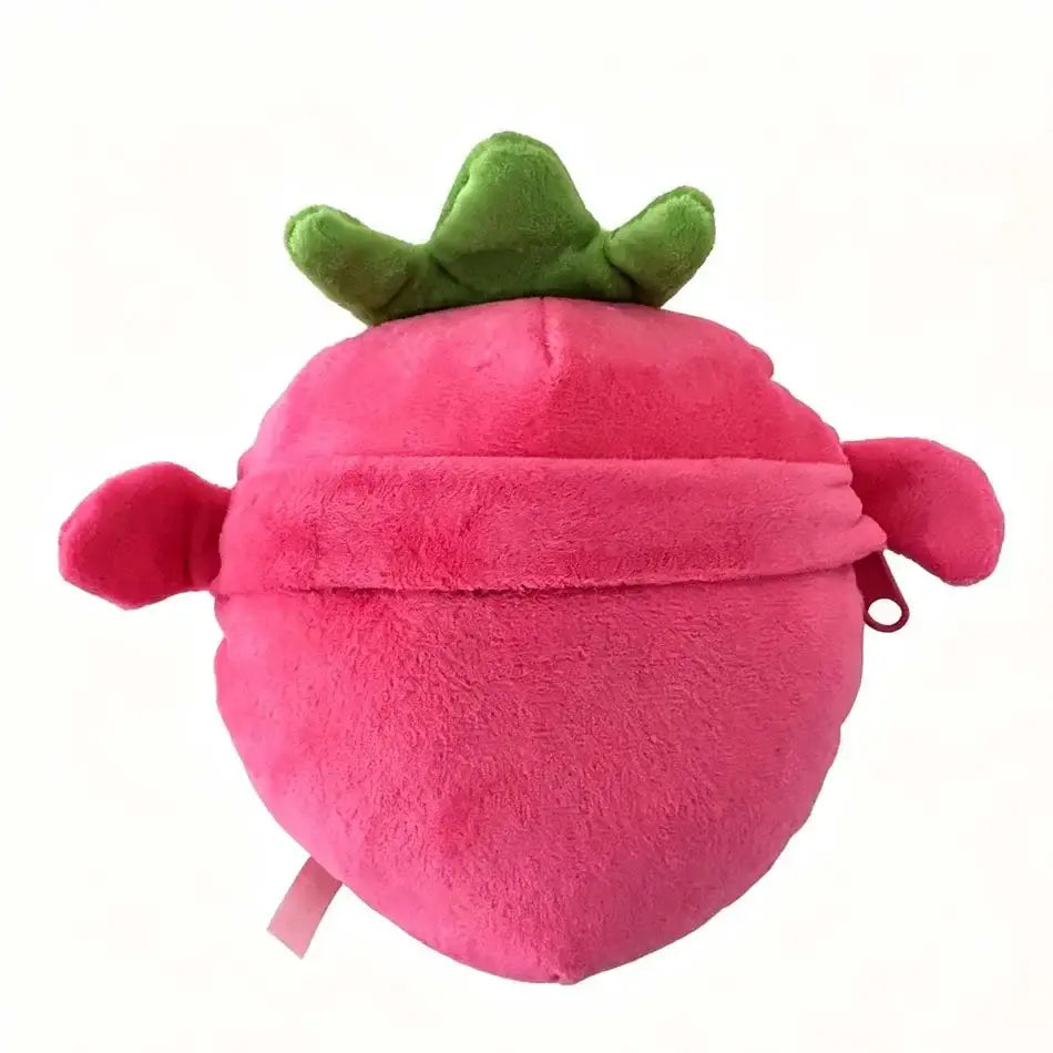 Pink plush strawberry-shaped coin purse with green leafy top and small pink ears designed as a stuffed animal toy.