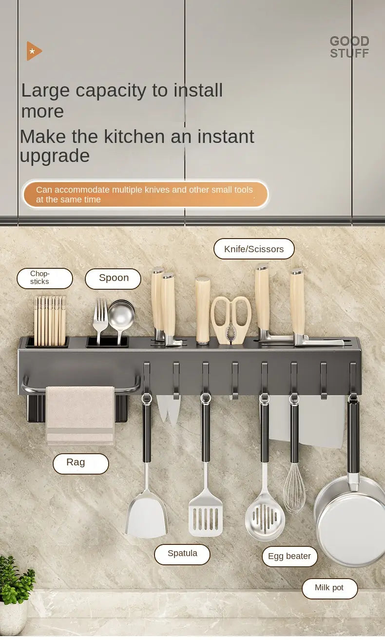 black metal wall mounted kitchen utensil holder and knife rack with multiple slots and hooks for organizing knives spoons spatulas and cooking tools