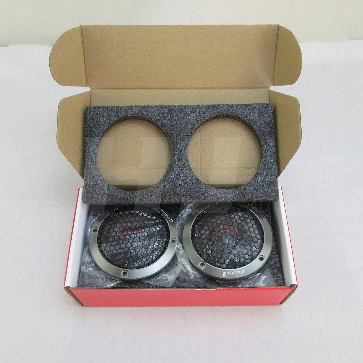 A pair of 3.5 inch car coaxial speakers qp353f featuring silver-framed black honeycomb mesh speaker grilles with a matte finish and subtle red accent lines.