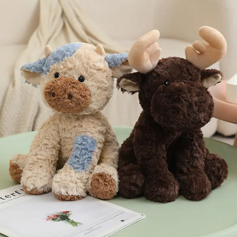 Plush stuffed animal toy 25cm featuring cute cream blue and brown plush cow and moose with soft textured fur.