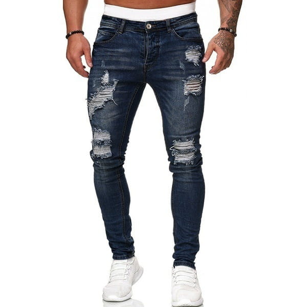 Männer rissen schmale Jeans aus dunklem Blau mit ausgewaschenem, distressed Finish und Riss-Kniepatches.