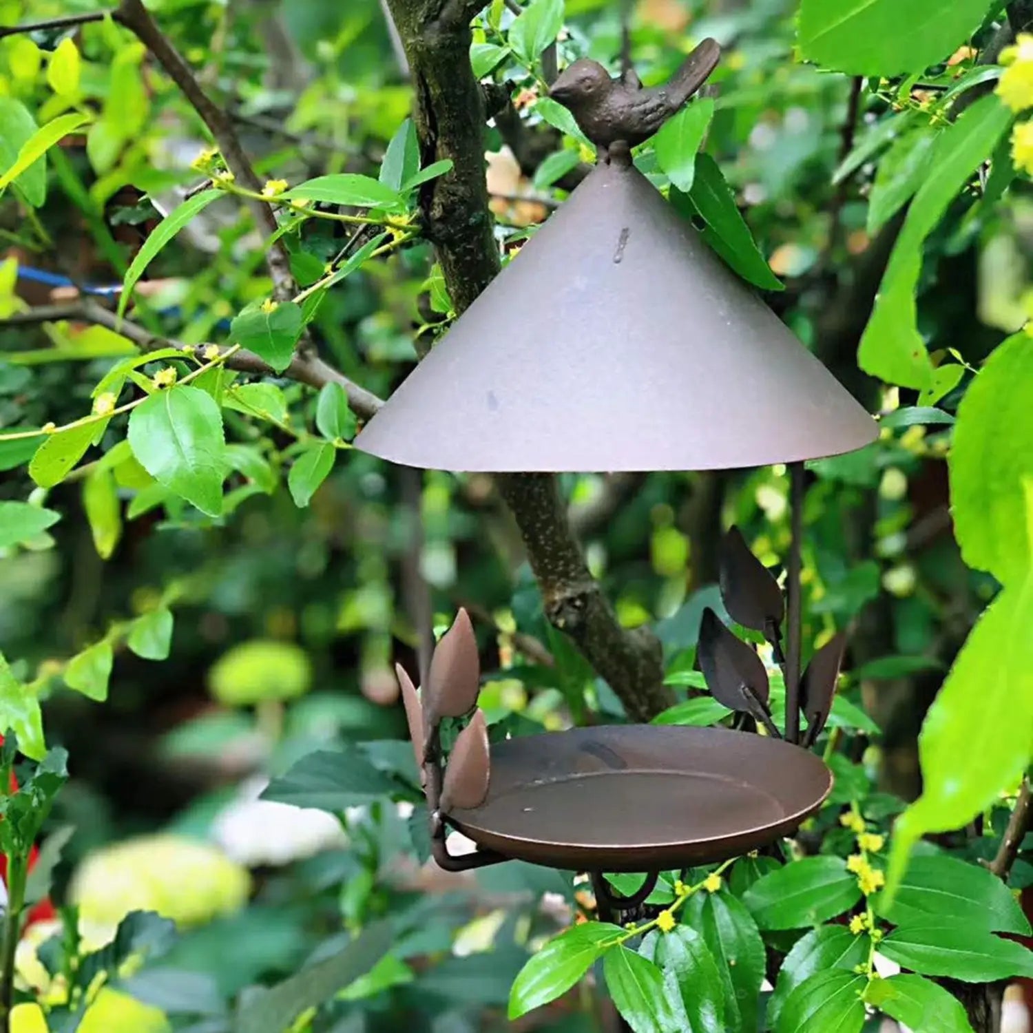 Feeder Hanging Pet Bird Feeder for Various Pet Birds Feeding Supplies Outdoor Bronze-colored metal hanging bird feeder for garden outdoor use with a conical roof, leaf-shaped side decorations, and a small sculpted bird on top.