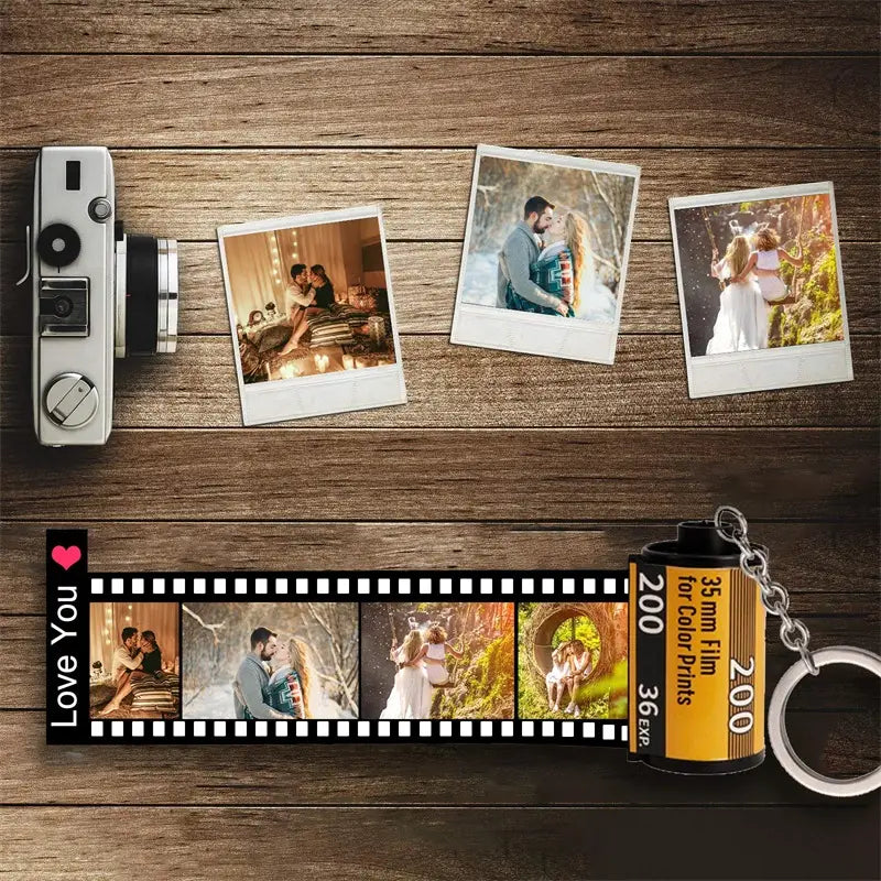 Silver custom photo film roll keychain shaped like a 35mm film canister with 200 printed on it featuring a customizable photo strip design and pink love you text