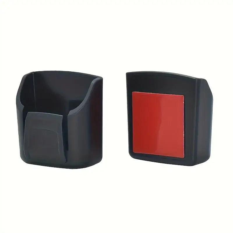 Black plastic car phone holder with red adhesive backing shown from the back side for car key organizer dashboard storage box.