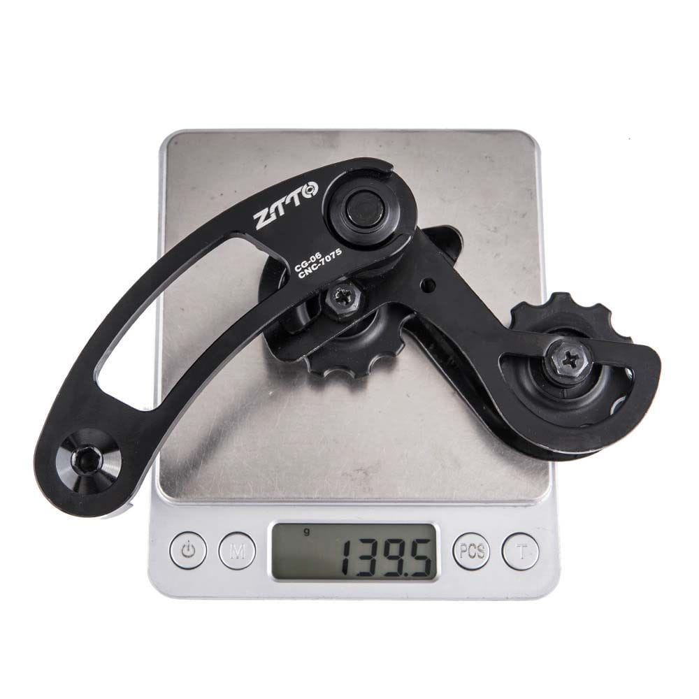 Black ztto cnc-machined aluminium alloy bike chain tensioner stabilizer rear derailleur with a sleek angular design and precise gear teeth shown from the back side.