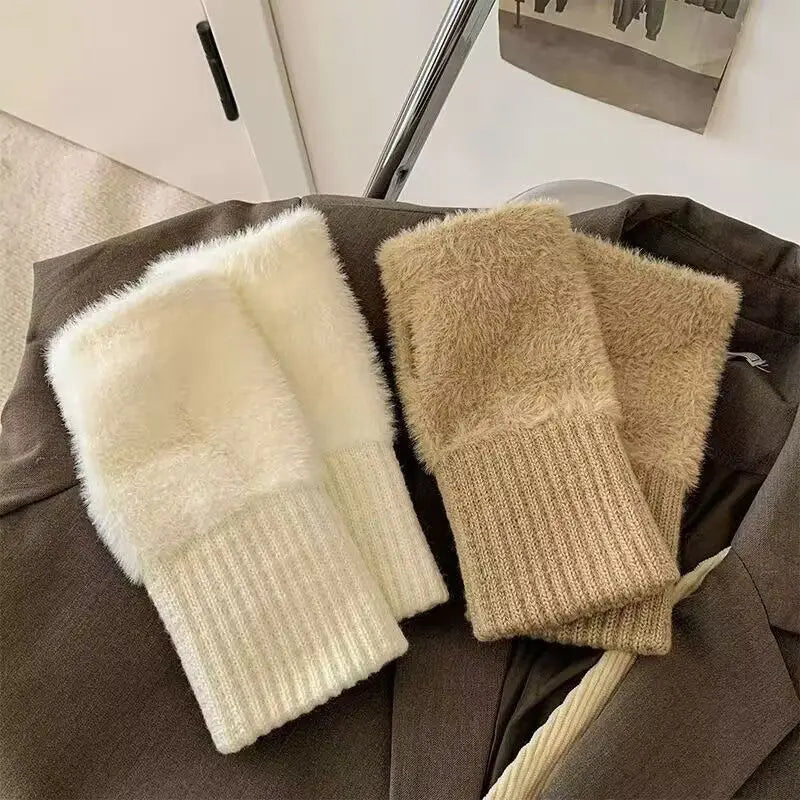 cream and beige plush fingerless gloves made of fuzzy knit with ribbed cuffs designed as warm winter wrist warmers