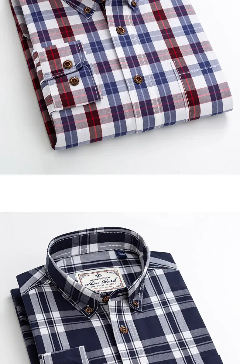 A neatly folded men’s cotton plaid long sleeve slim fit shirt with a classic collar and chest pocket in navy blue white gray stripes and red blue white checks.