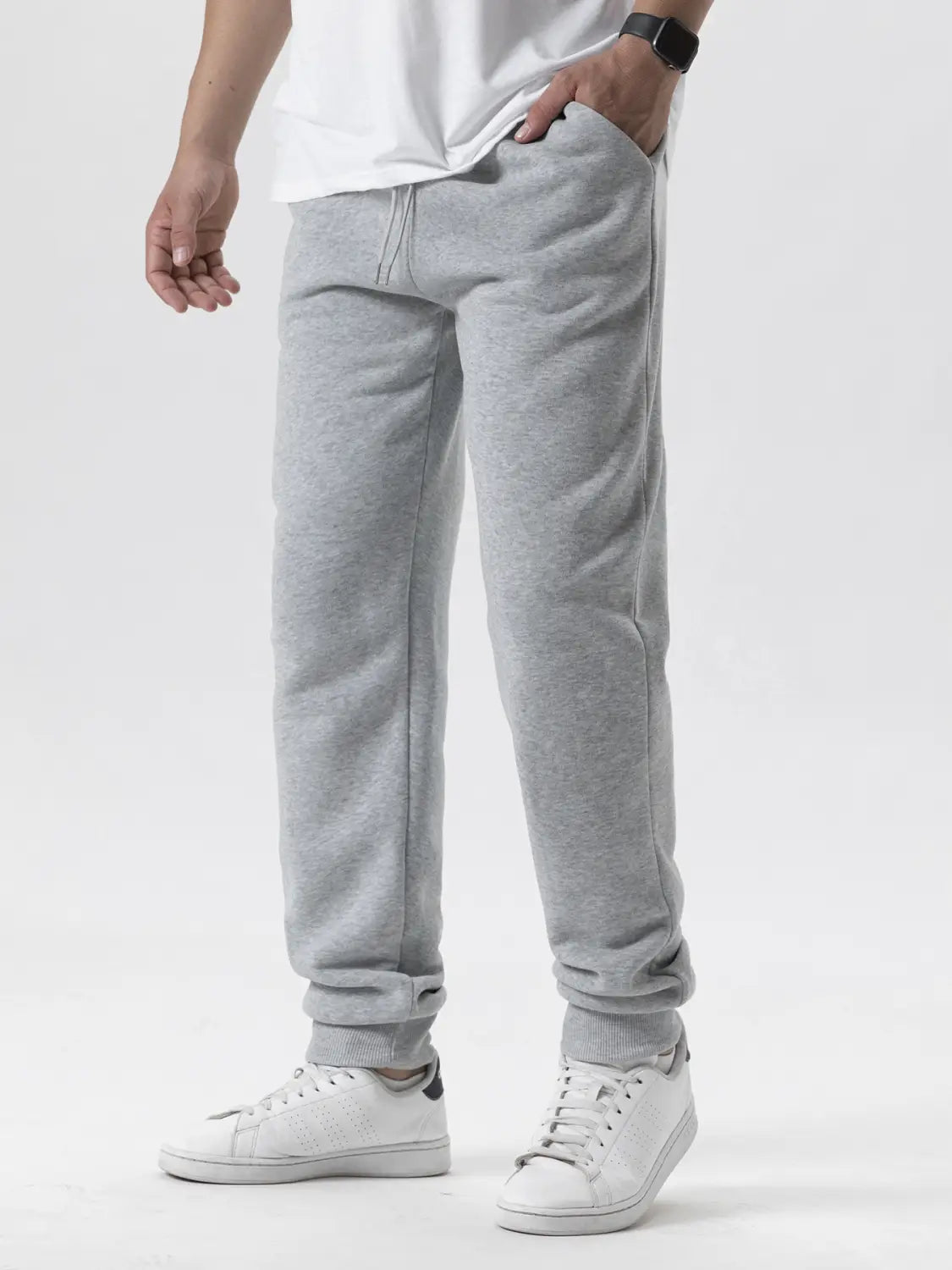 Pantalons de jogging en polaire pour hommes, style décontracté pour l’hiver, en molleton chiné gris, avec des poignets côtelés et une taille à cordon de serrage.