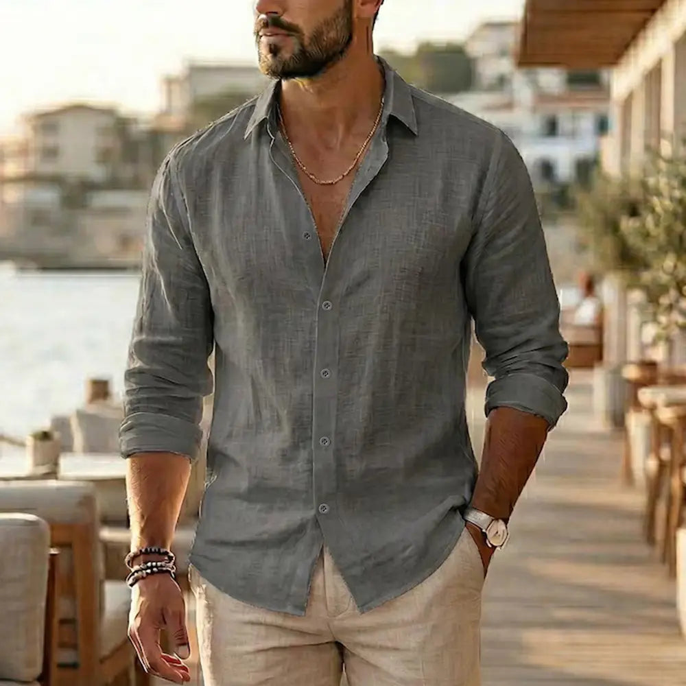 Mens cotton linen long sleeve casual shirt in gray linen with a button-down front and rolled-up sleeves featuring a relaxed fit.