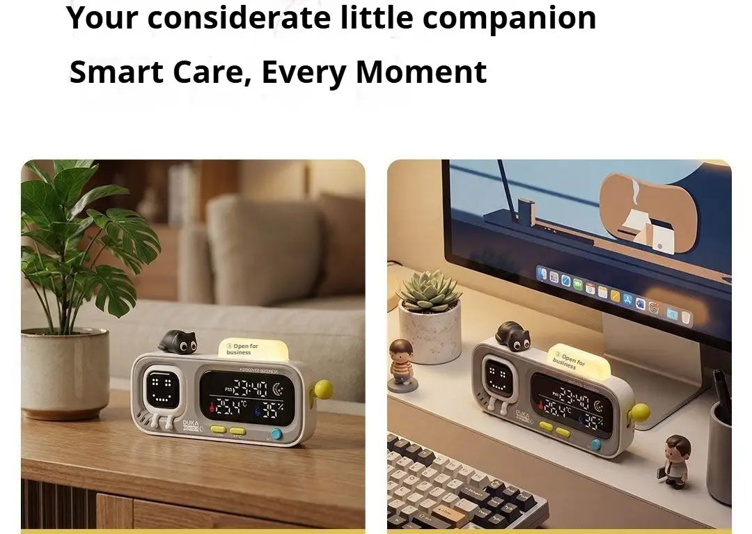gray digital alarm clock duka mooda smart with dual screens displaying time and temperature featuring a cute cat face design for smart temperature monitoring.