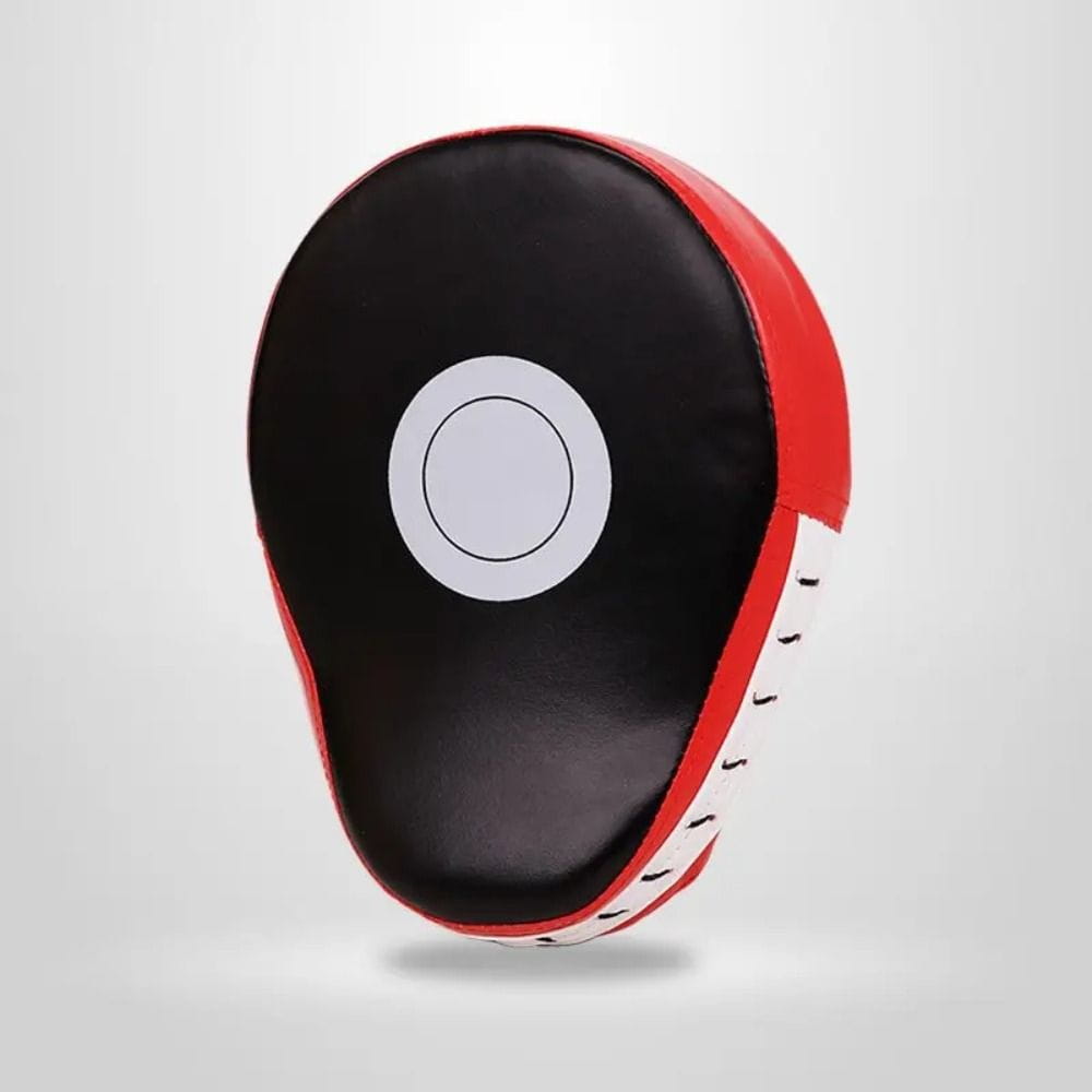 Red and black boxing punch pad focus mitt target with a white circular target in the center designed for fitness gear training.
