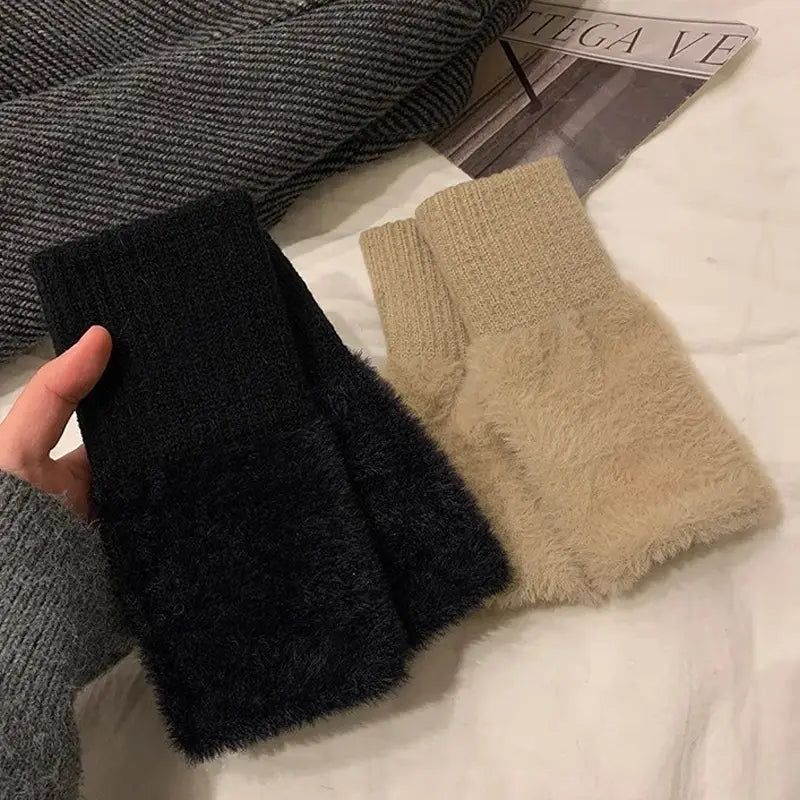 black and beige fuzzy knit leg warmers with ribbed cuffs designed as plush fingerless gloves for warm winter wrist wear
