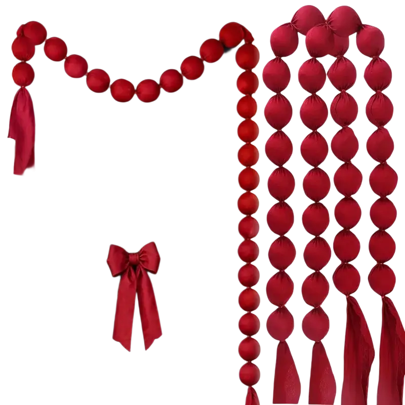 Red velvet ball garland with tied ribbon ends in burgundy for Christmas tree window mantel decoration