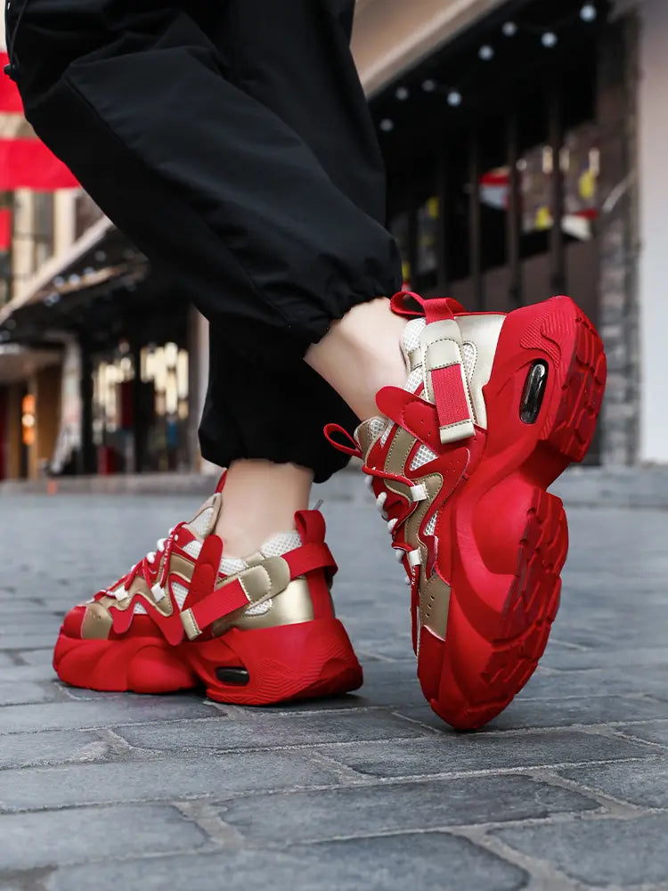 Men chunky air cushion casual sneakers in red and gold featuring bold layered straps and a thick rubber sole.