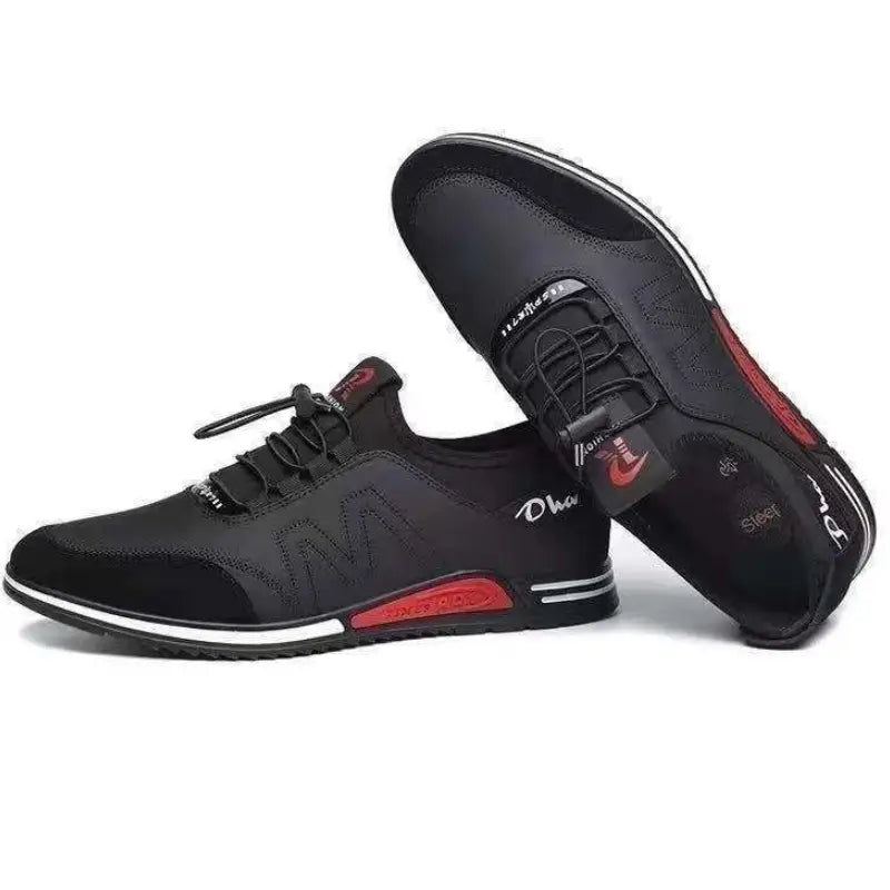 Men casual leather sneakers in black and red featuring breathable mesh uppers and non slip contrasting rubber soles with a sleek modern design.