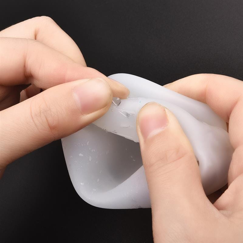 White silicone phone case with soft flexible texture and rounded edges designed as part of an epoxy resin mixing tool set for diy jewelry making.