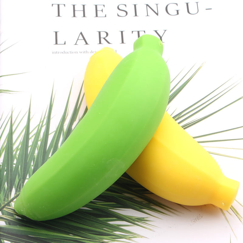 silicone banana slow rising stress relief toys in green and yellow shaped like bananas viewed from above