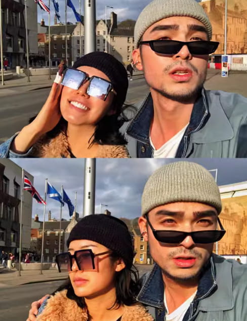 The woman wears a ribbed knit winter beanie hat in dark color paired with oversized rectangular sunglasses with reflective silver lenses and dark frames.