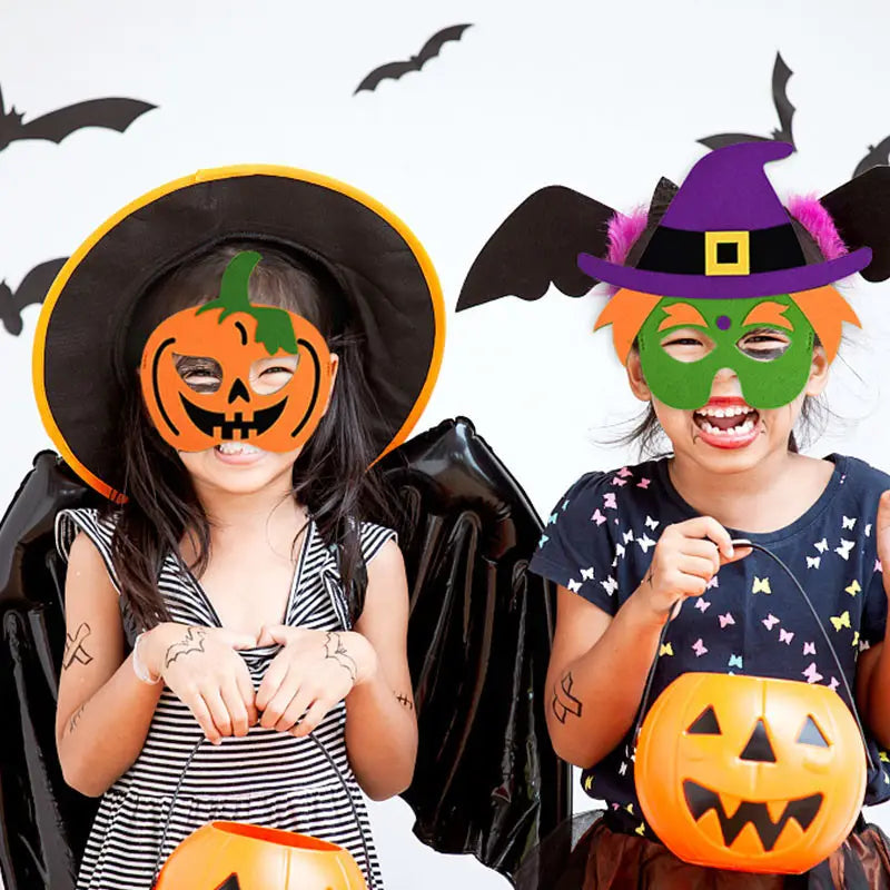 Orange plastic halloween pumpkin ghost bucket featuring black triangular eyes and a jagged mouth for use with pumpkin ghost diy and ghost diy mask party costumes.