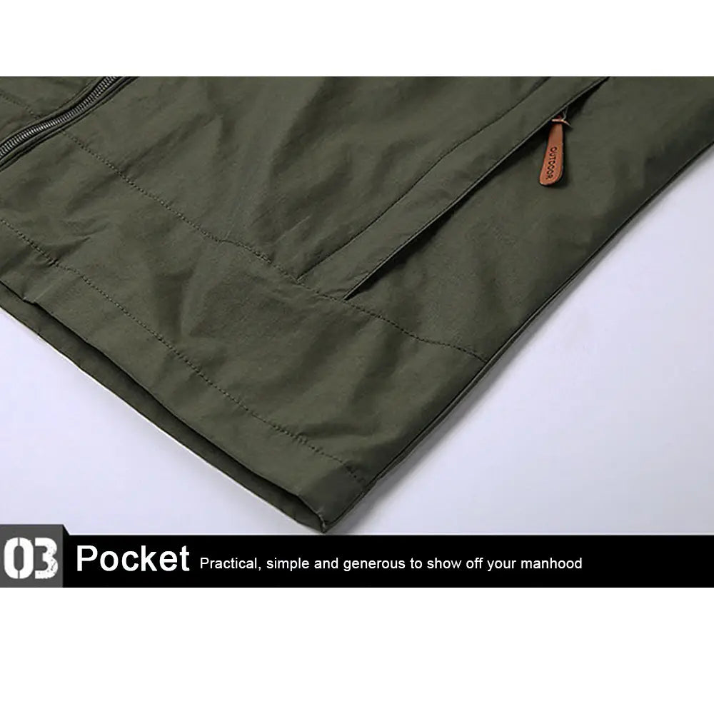 Olive green nylon pocket of men’s waterproof tactical hooded jacket with brown leather zipper pull.