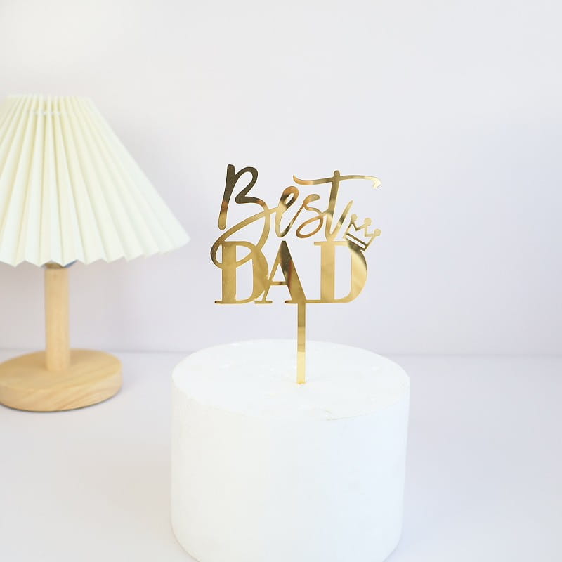 Gold metallic best dad acrylic cake topper with crown design for Father’s Day celebration