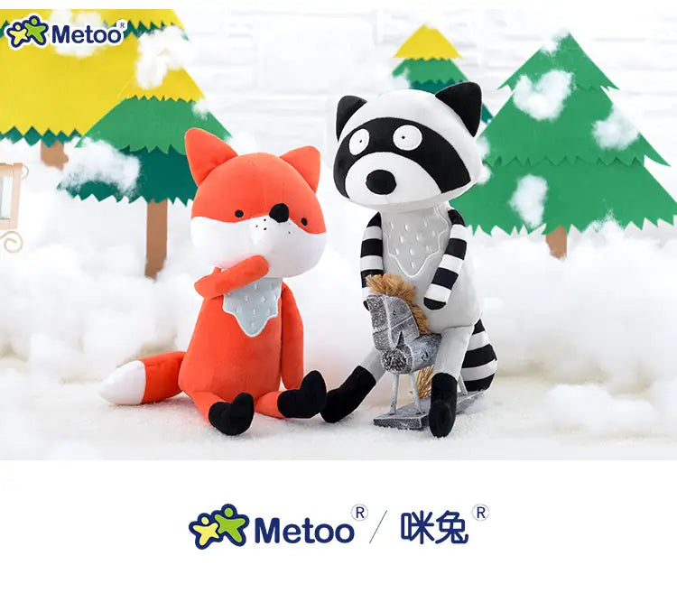 Cute stuffed animal fox plush toy 33cm in orange with white muzzle and black paws sitting beside a raccoon plush in a snowy forest scene as part of stuffed animal toys featuring fox raccoon squirrel designs.