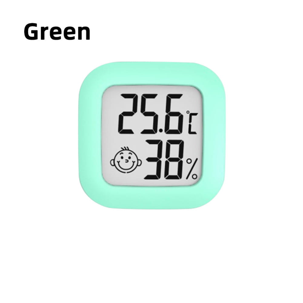 A mint green square digital thermometer and hygrometer room sensor with rounded edges displays temperature and humidity readings on a gray screen within its measurement range.