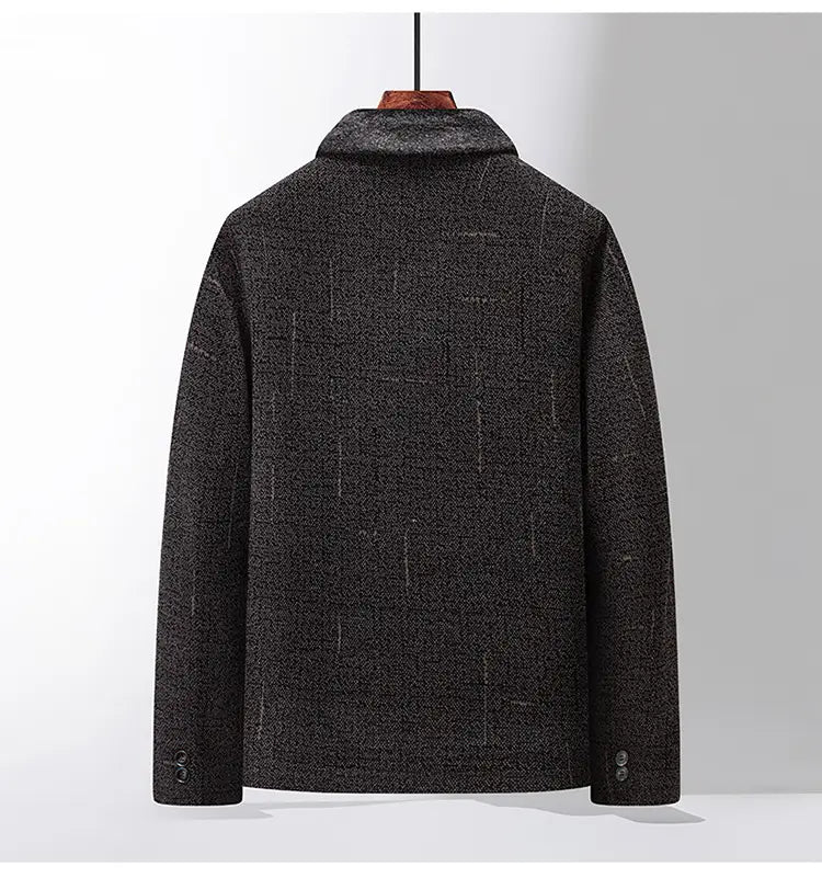 Abrigo tipo gabardina de mezcla de lana gris oscuro para hombre, con patrón de textura sutil y cuello clásico, ideal para el uso en invierno.