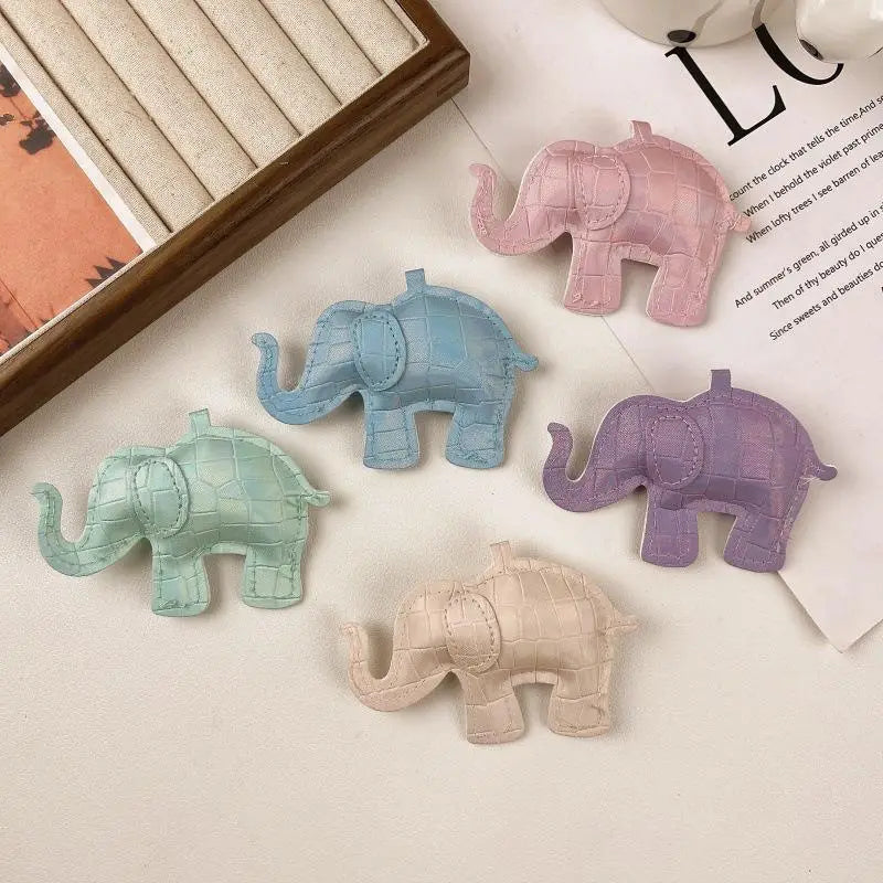Pastel-colored pu leather elephant keychain with crocodile skin texture and stitched details designed as a diy animal charm.