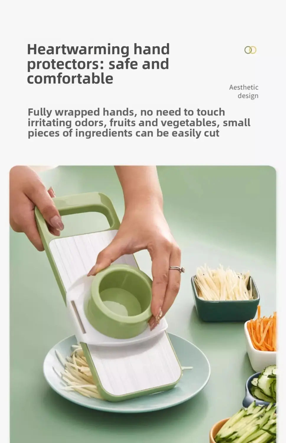Light green and white stainless steel multi-functional vegetable slicer shredder with a hand protector and circular cutting bowl.