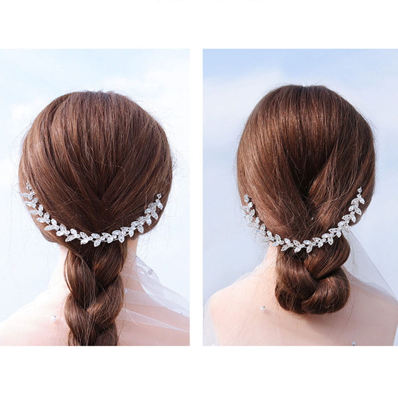 Silver leaf-shaped bridal headband hair accessory adorned with sparkling crystals for wedding use.