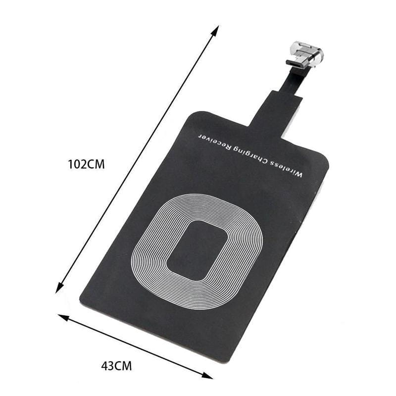 Black wireless charging receiver for type c Android phones featuring a silver coil pattern and metallic clasp on the back side.