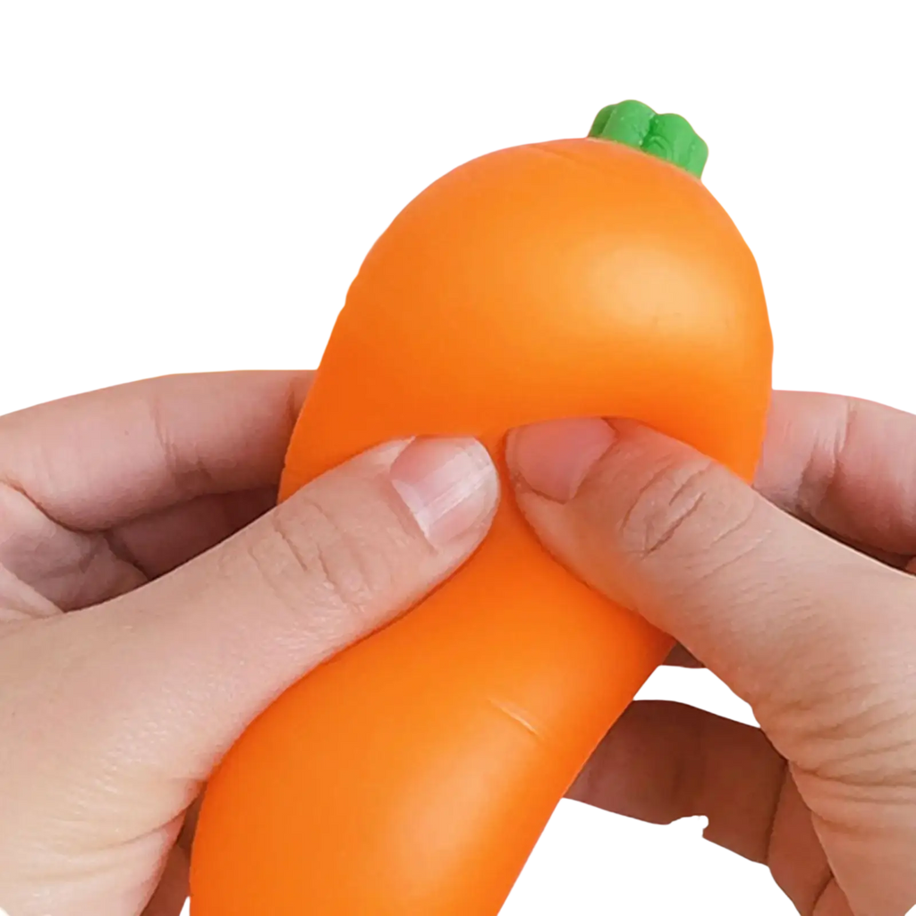 Front view of an orange carrot shaped slow rebound squeeze toy with green leafy top made of soft silicone